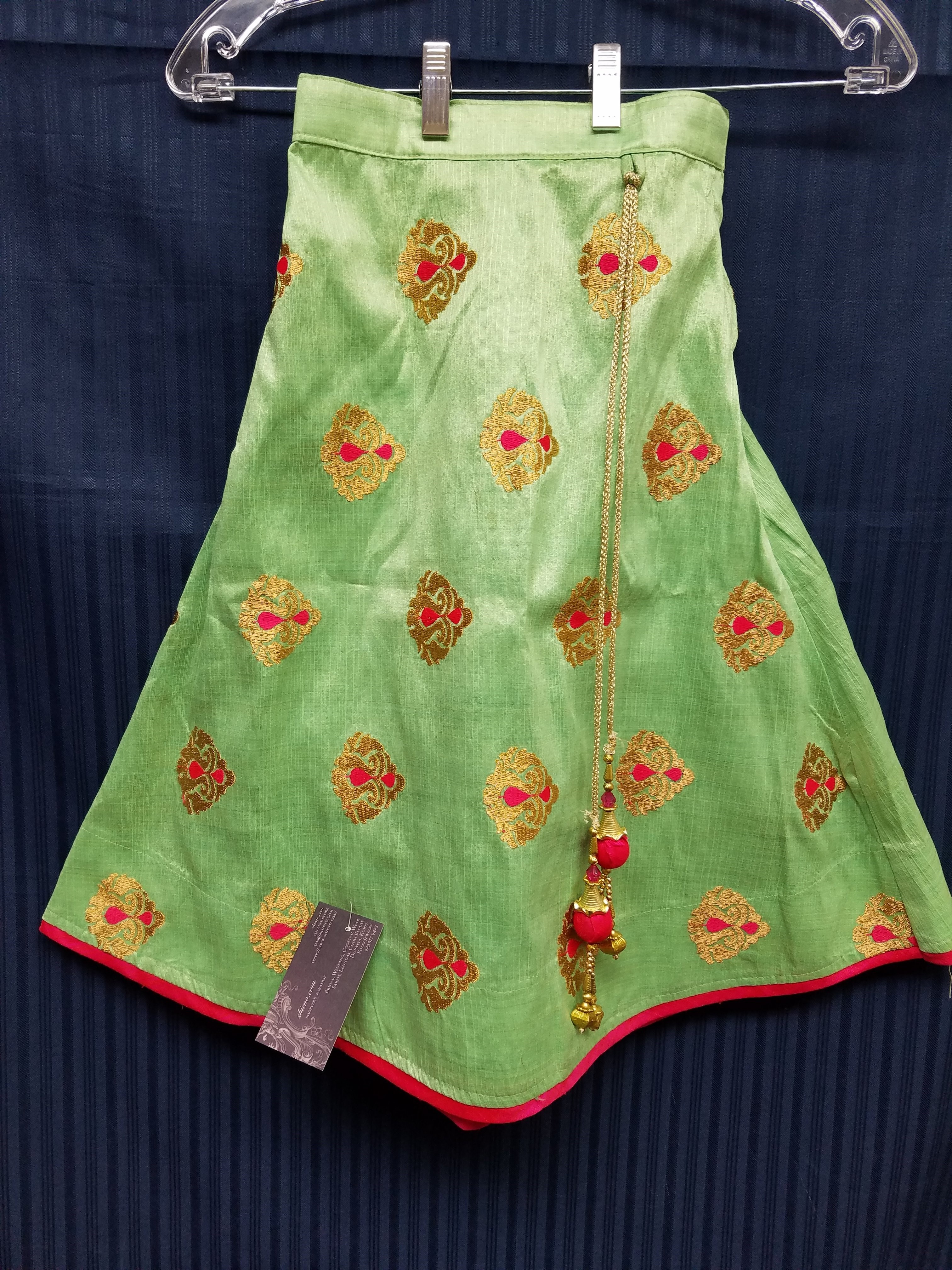 green lehenga with pink choli